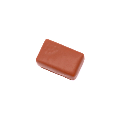 Une ganache bergamote enrobée de chocolat au lait.